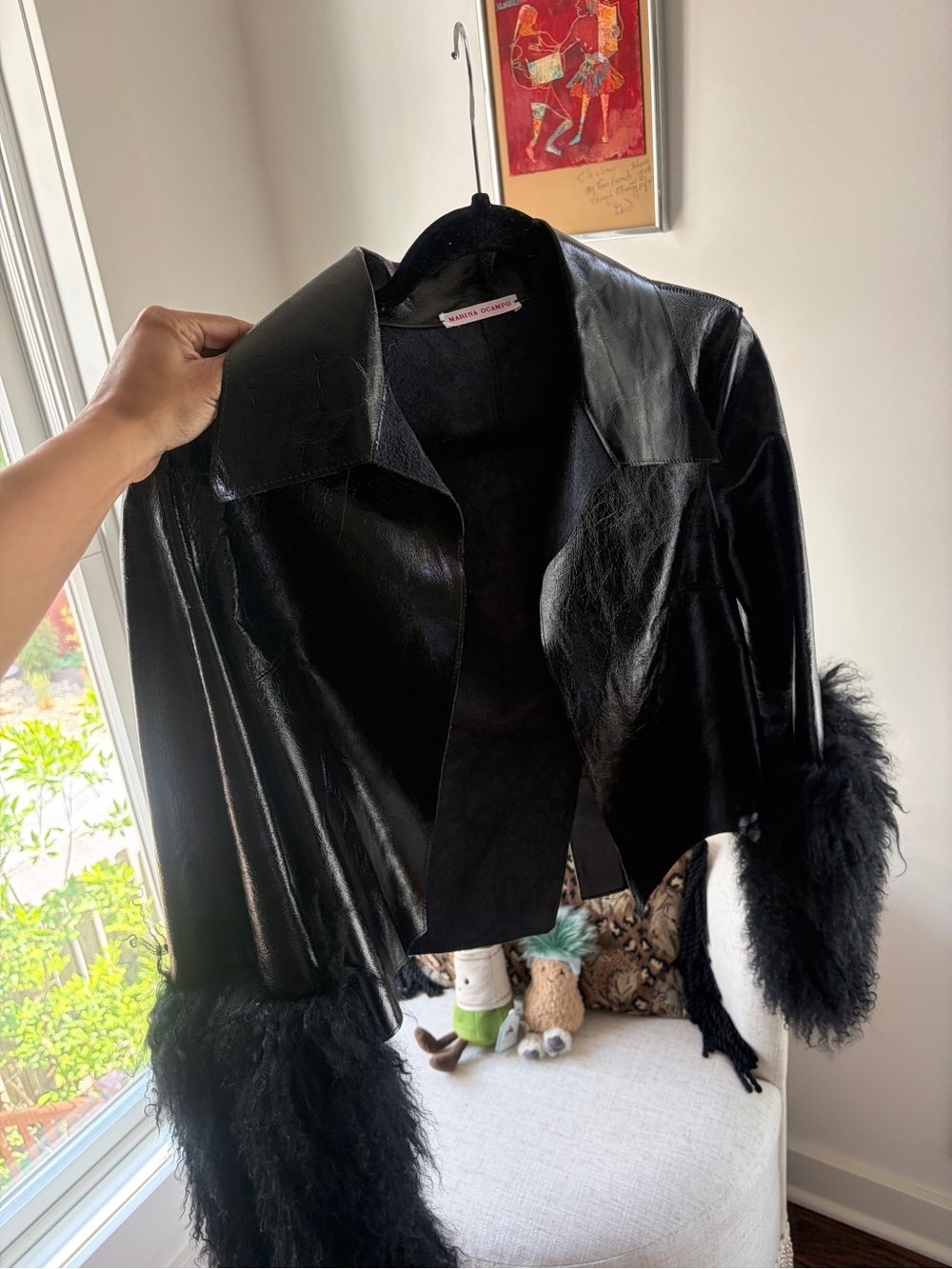 Women's Black Faux Leather Jacket with Feather Cuffs